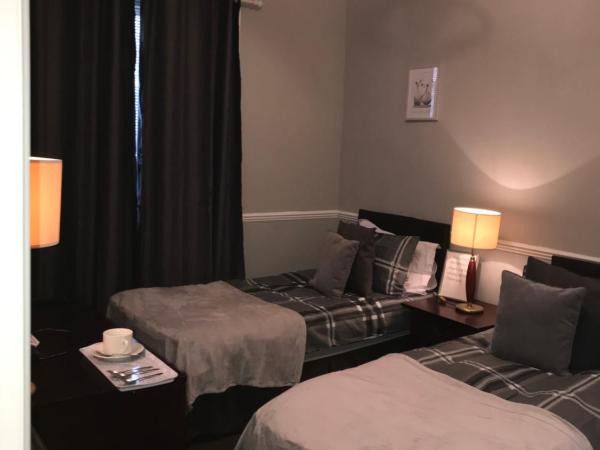 The Ocean Inn : photo 3 de la chambre chambre lits jumeaux avec salle de bains