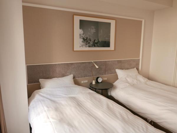 Tokyo Sakurako Hatchobori : photo 9 de la chambre chambre lits jumeaux