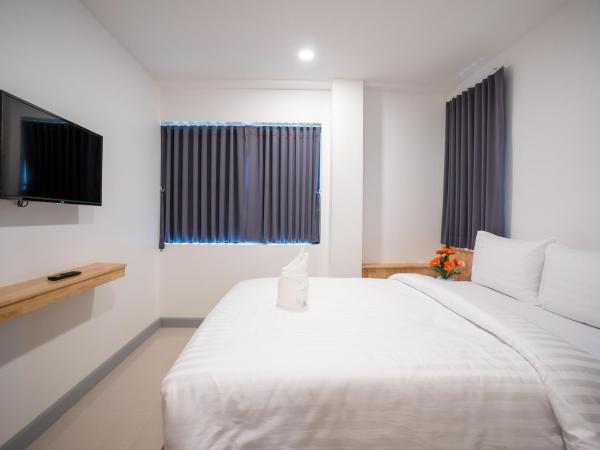 Meesuk ChiangRai Hotel, SHA Certified : photo 3 de la chambre chambre familiale supérieure