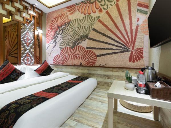 Zou Qu Ye Travel Hotel : photo 1 de la chambre petite chambre double