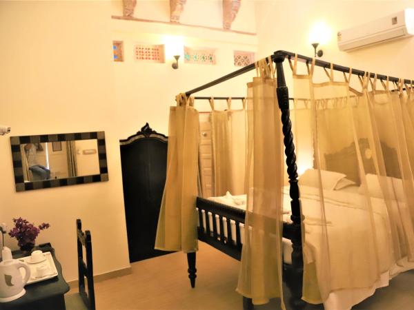 The Kothi Heritage : photo 1 de la chambre chambre deluxe double ou lits jumeaux