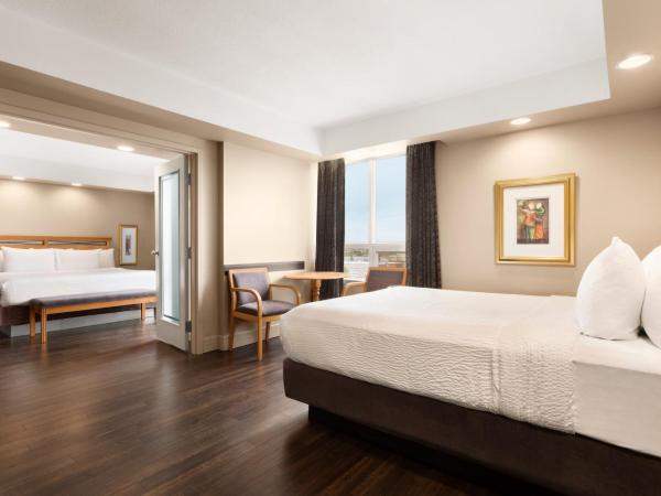 Royal Hotel Calgary, Trademark Collection by Wyndham : photo 3 de la chambre suite familiale 1 chambre avec 1 lit king-size et 1 lit queen-size - non-fumeurs