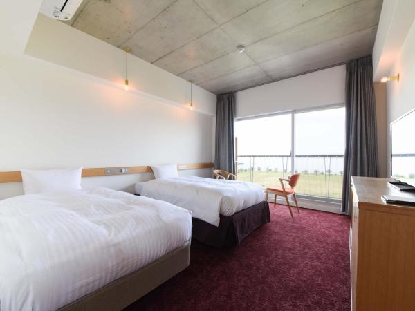 Hotel Lodge Maishima : photo 1 de la chambre chambre lits jumeaux standard - vue sur mer