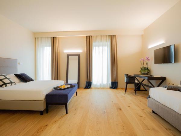 Hotel Politeama : photo 1 de la chambre chambre triple