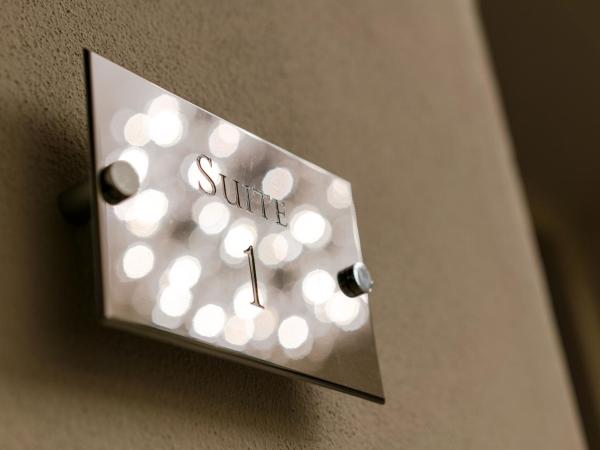 Palazzo Cini Luxury Rooms in Pisa : photo 1 de la chambre chambre double supérieure avec baignoire spa