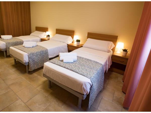 Santa Teresa House : photo 1 de la chambre chambre triple