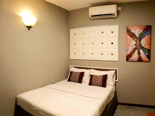 Tc theme park Guest house : photo 2 de la chambre chambre lit queen-size deluxe