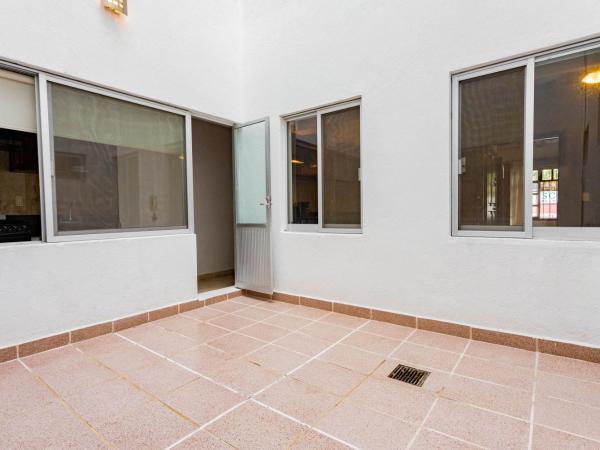 Olas Altas Suites Departamentos : photo 10 de la chambre chambre lit queen-size - vue intérieure