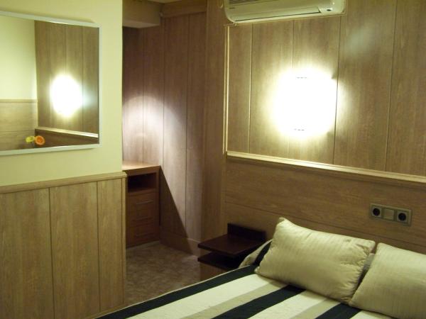 Hostal El Carmen : photo 3 de la chambre chambre double basique