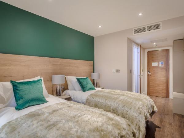 Dwell City Living : photo 7 de la chambre chambre lits jumeaux