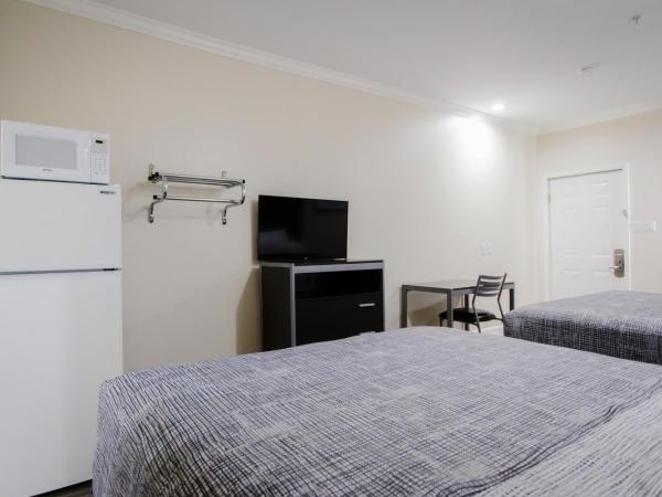 Palace Inn TX-249 : photo 9 de la chambre suite avec kitchenette - non-fumeurs