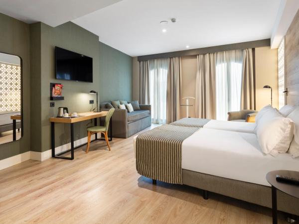 Catalonia Santa Justa : photo 3 de la chambre chambre double ou lits jumeaux deluxe avec accès au spa