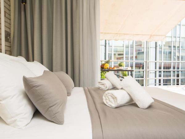 SUITES@SYNGROU-FIX : photo 2 de la chambre suite junior avec balcon