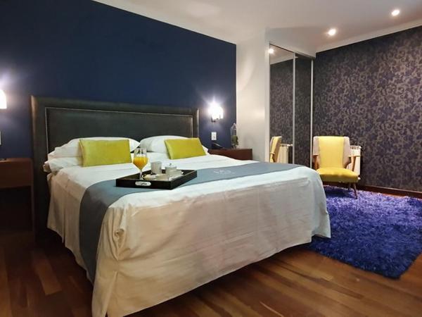 MG Design Hotel Boutique : photo 1 de la chambre chambre supérieure lit queen-size