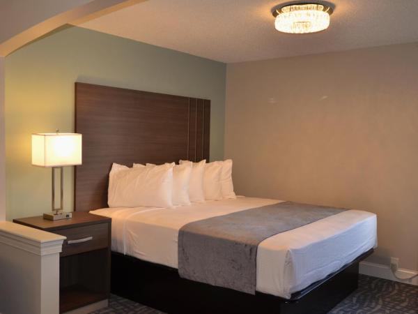 Opal Hotel & Suites : photo 5 de la chambre chambre lit king-size exécutive rénovée