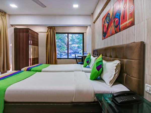 Treebo Lake Bloom Powai : photo 9 de la chambre chambre double standard