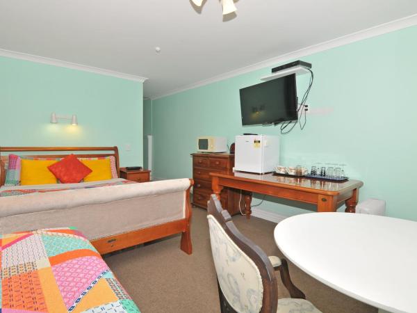 Richmond Guest House : photo 3 de la chambre chambre triple avec salle de bains privative