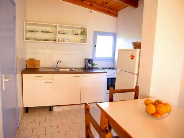 Résidence Marina di Capitello : photo 7 de la chambre appartement supérieur