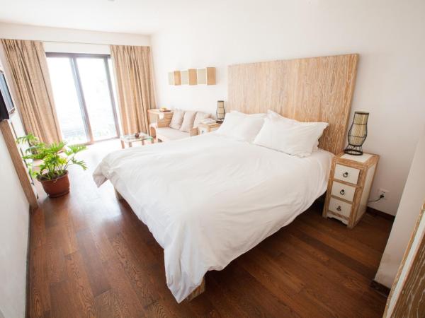 The Orchid Hotel - Old Town & Drum Tower : photo 9 de la chambre chambre côté jardin