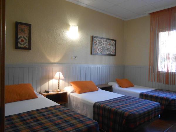 Hostal El Callejón : photo 1 de la chambre chambre triple