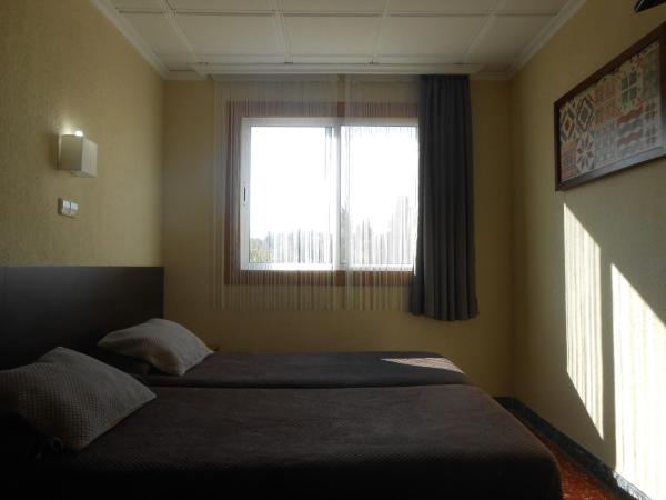 Hostal El Callejón : photo 9 de la chambre chambre lits jumeaux