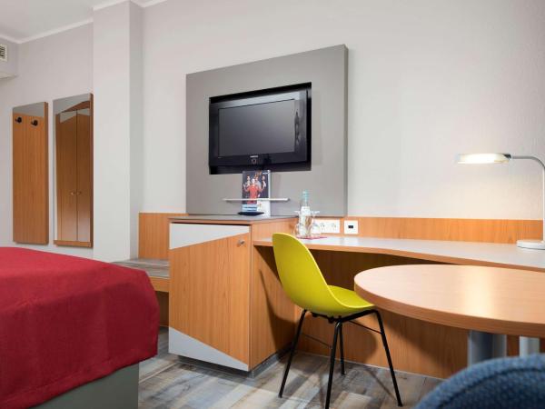 Ramada by Wyndham Hannover : photo 4 de la chambre chambre standard - 1 lit queen-size 