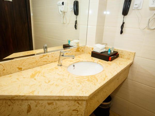 Lintas Platinum Hotel : photo 4 de la chambre chambre lits jumeaux deluxe