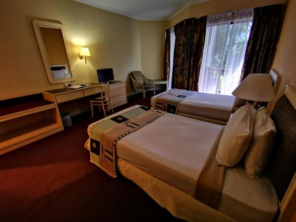 The Grand Beach Resort Port Dickson : photo 4 de la chambre chambre lits jumeaux standard