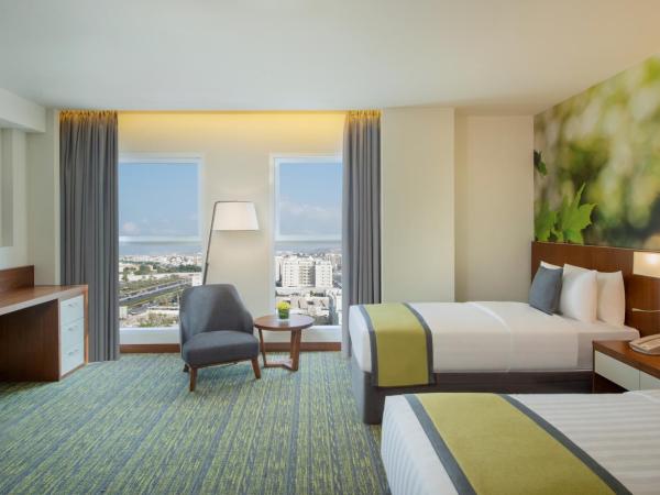 Wyndham Garden Muscat Al Khuwair : photo 2 de la chambre chambre lit king-size supérieure - non-fumeurs