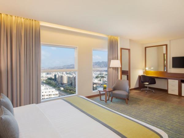 Wyndham Garden Muscat Al Khuwair : photo 5 de la chambre chambre lit king-size deluxe - non-fumeurs