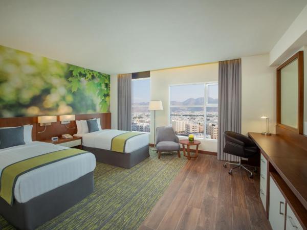 Wyndham Garden Muscat Al Khuwair : photo 4 de la chambre chambre lits jumeaux supérieure - non-fumeurs