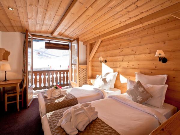 Hotel les Flocons : photo 1 de la chambre chambre double ou lits jumeaux supérieure