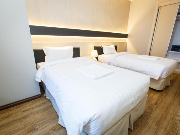 Lintas Platinum Hotel : photo 2 de la chambre chambre lits jumeaux deluxe