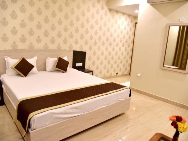 Hotel Triveni Residency : photo 1 de la chambre chambre lit king-size deluxe