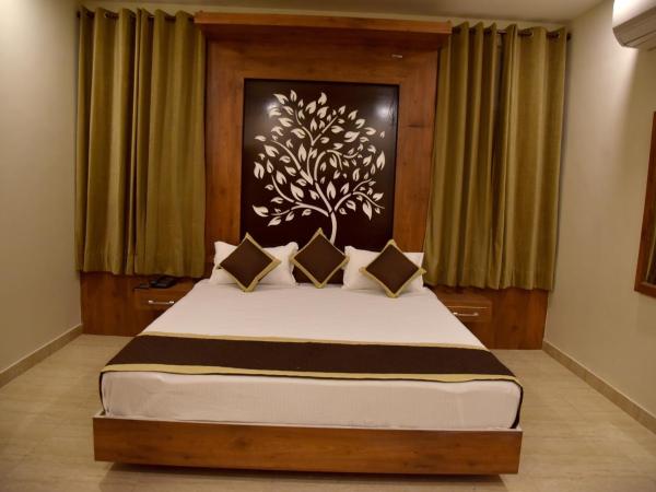 Hotel Triveni Residency : photo 10 de la chambre chambre lit king-size deluxe