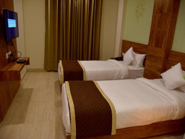 Hotel Triveni Residency : photo 7 de la chambre chambre double ou lits jumeaux standard