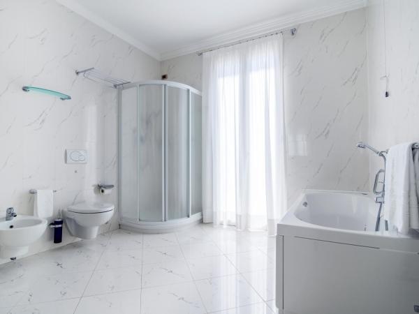 Casa Bianca Al Mare : photo 2 de la chambre suite