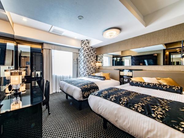 APA Hotel & Resort Midosuji Hommachi Eki Tower : photo 1 de la chambre chambre lits jumeaux supérieure - non-fumeurs