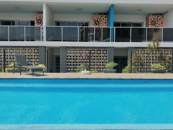 Ramada Suites by Wyndham Zen Quarter Darwin : photo 3 de la chambre appartement avec cour et accès à la piscine 