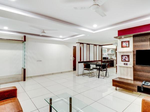 Treebo Saga Apartment : photo 9 de la chambre chambre double supérieure [assainie]