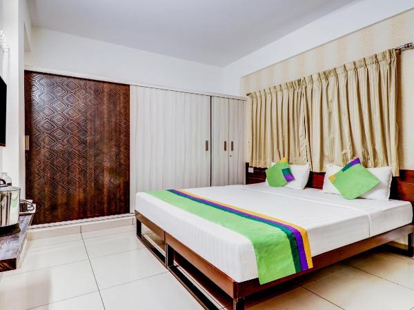 Treebo Saga Apartment : photo 1 de la chambre chambre double supérieure [assainie]