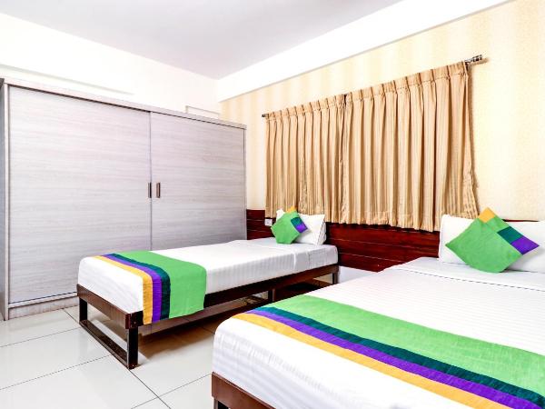 Treebo Saga Apartment : photo 3 de la chambre chambre double supérieure [assainie]