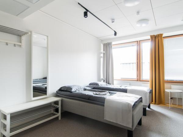 Moi Aikatalo Hostel Helsinki : photo 1 de la chambre chambre triple basique