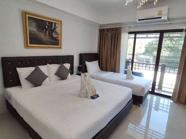 Bann Tawan Hostel Chiang Rai : photo 2 de la chambre chambre triple