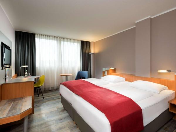 Ramada by Wyndham Hannover : photo 7 de la chambre chambre lit king-size standard