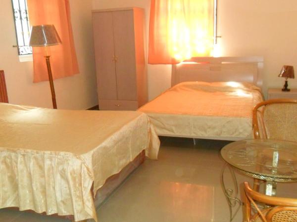 Auberge Les Lilas : photo 2 de la chambre chambre lits jumeaux standard