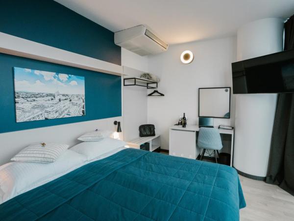 Hotel Blue : photo 1 de la chambre chambre double ou lits jumeaux - vue sur ville
