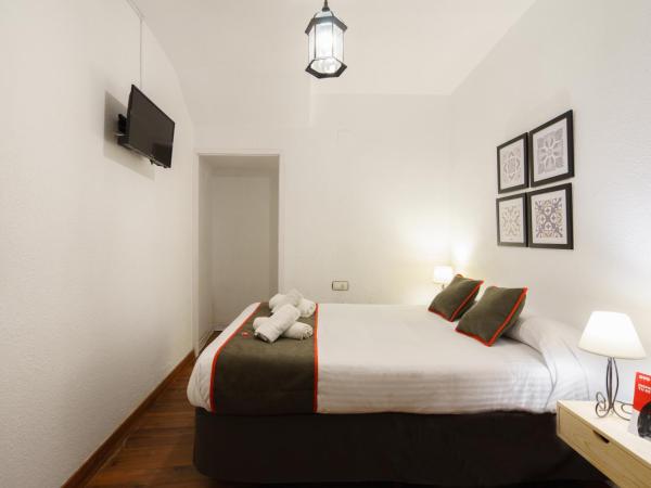 Hostal Austria : photo 9 de la chambre chambre triple