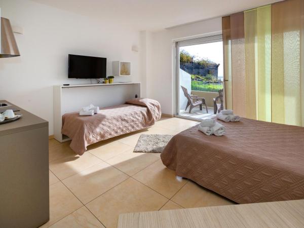 Zeus Hotel - Aparthotel - Meeting & Congress : photo 7 de la chambre chambre triple - vue sur mer