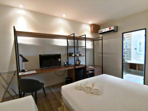 Roxy Hotel Padungan : photo 4 de la chambre chambre triple